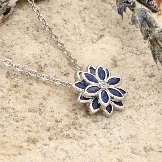 Get your Royal Azure: Sapphire-Blue Cubic Zirconia Sterling Silver Flower Necklace online now or in store at Forever Gems in Franschhoek, South Africa