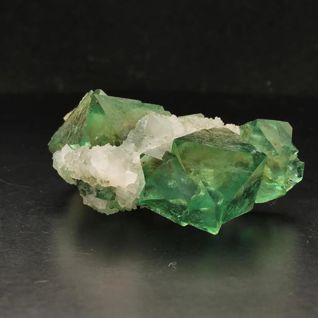 Get your Riemvasmaak Green Octahedral Fluorite Cluster online now or in store at Forever Gems in Franschhoek, South Africa