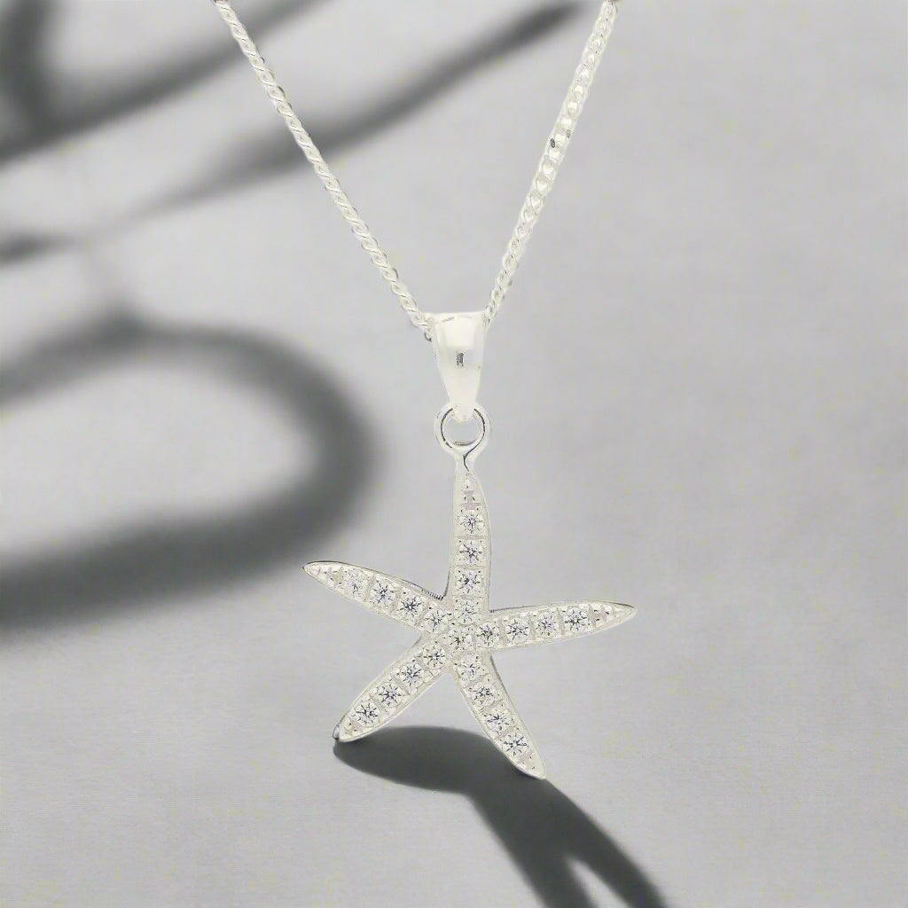 Get your Sparkling Starfish: Your New Go-To Sterling Silver & CZ Necklace! online now or in store at Forever Gems in Franschhoek, South Africa