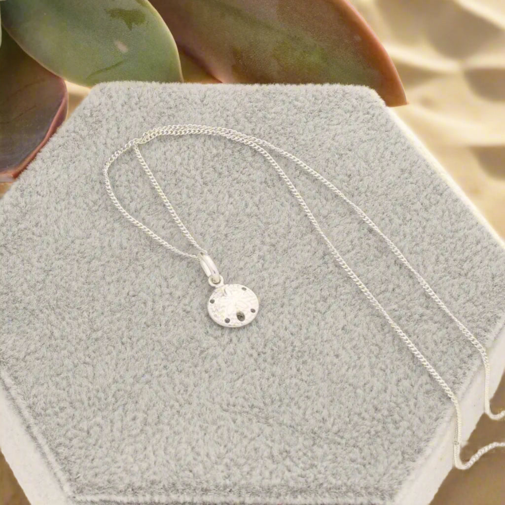 Get your Beach Bliss: Your Sterling Silver Pansy Shell Necklace! online now or in store at Forever Gems in Franschhoek, South Africa