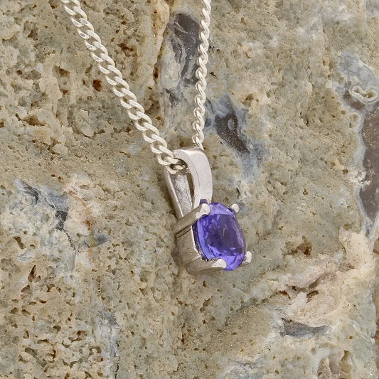Get your Elegant 4-Claw Round Tanzanite Sterling Silver Solitaire Necklace online now or in store at Forever Gems in Franschhoek, South Africa