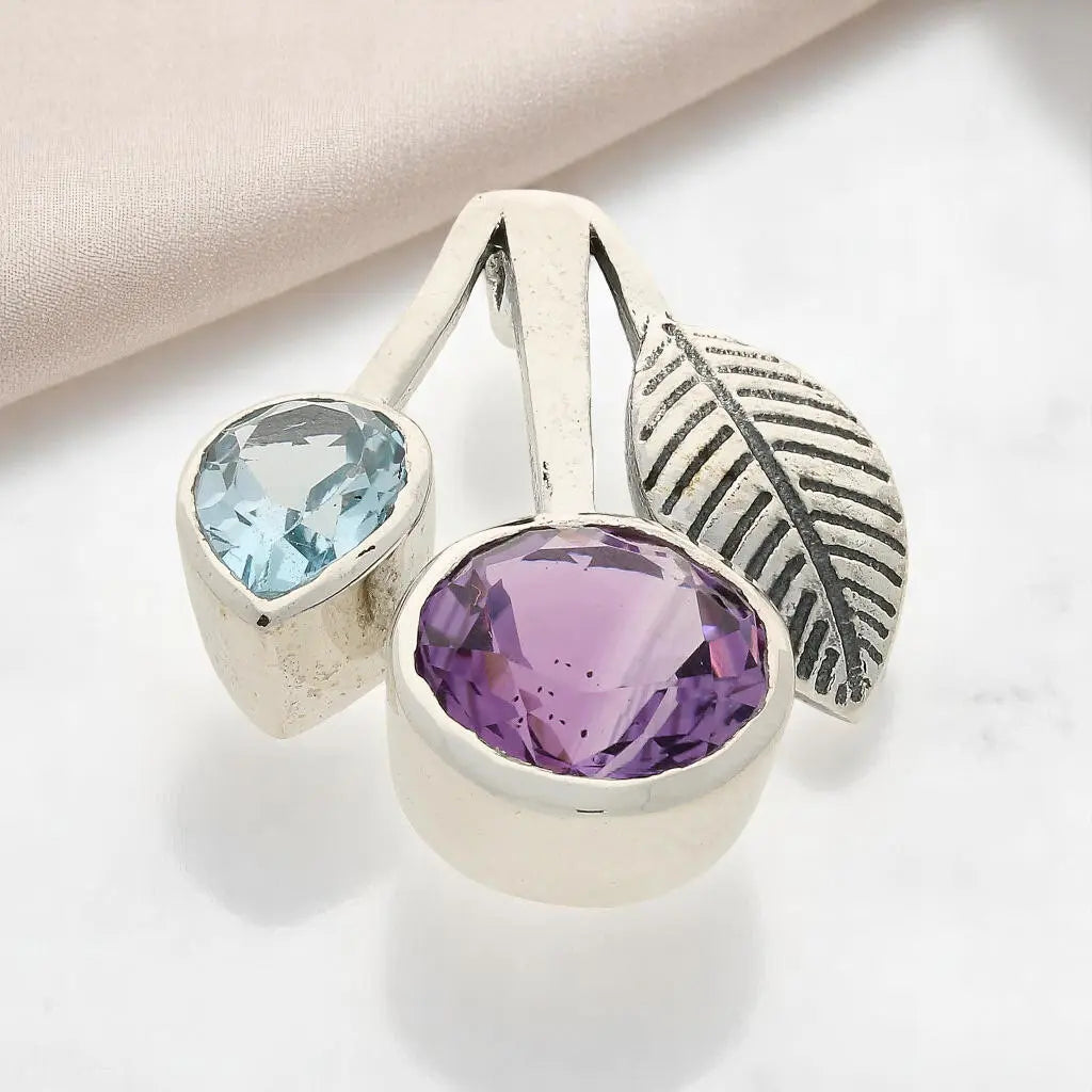 Buy your Celestial Harmony - Amethyst & Blue Topaz Silver Pendant online now or in store at Forever Gems in Franschhoek, South Africa