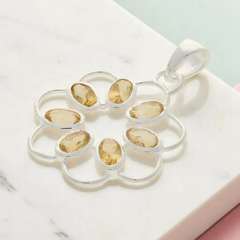 Get your Sunny Citrine Flower in Sterling Silver online now or in store at Forever Gems in Franschhoek, South Africa