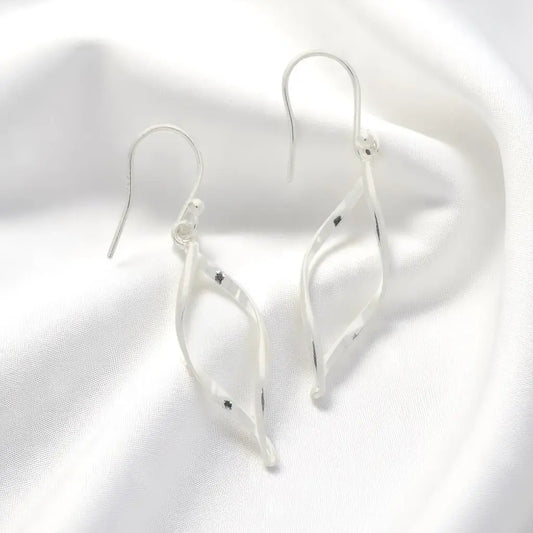 Get your Sleek Swirl: Modern Sterling Silver Twist Drop Earrings! online now or in store at Forever Gems in Franschhoek, South Africa