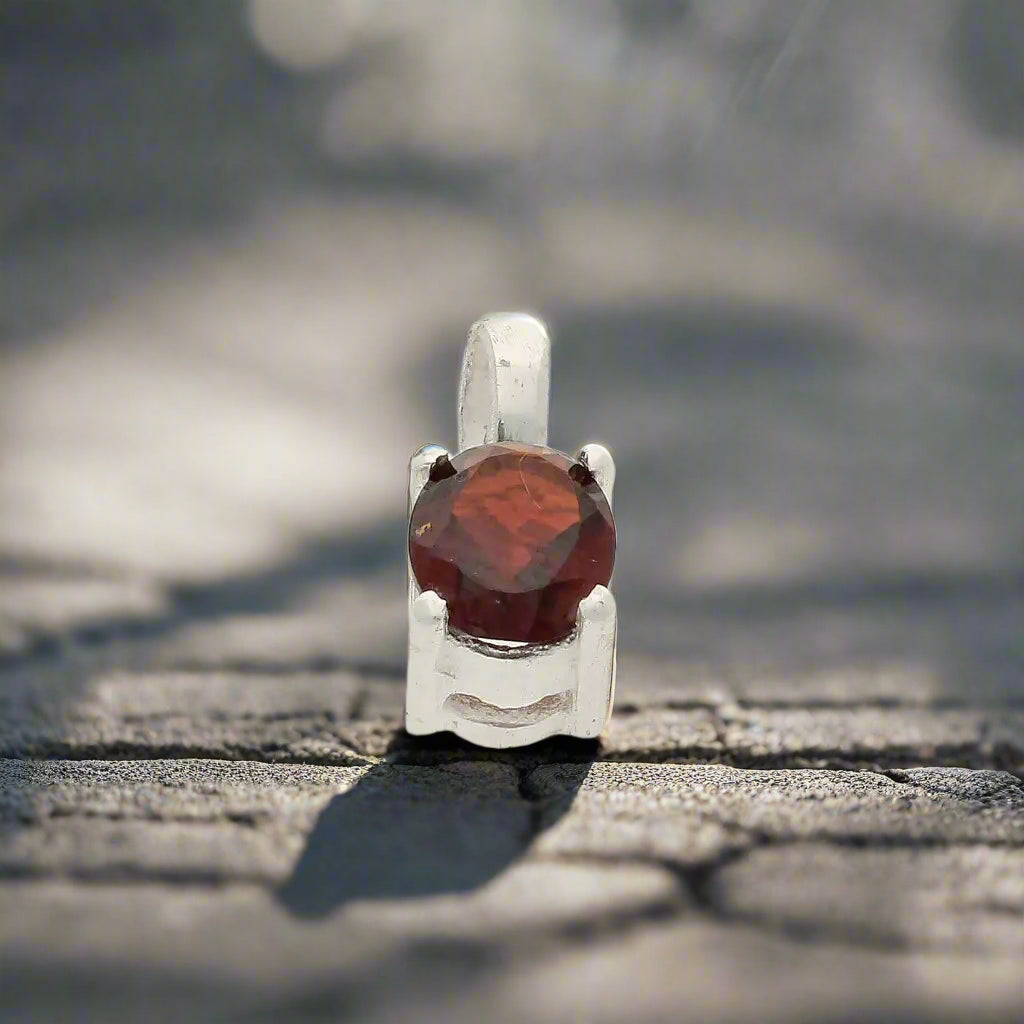 Get your Garnet "Firelight Romance" Sterling Silver Pendant - Passion's Perfect Flame online now or in store at Forever Gems in Franschhoek, South Africa