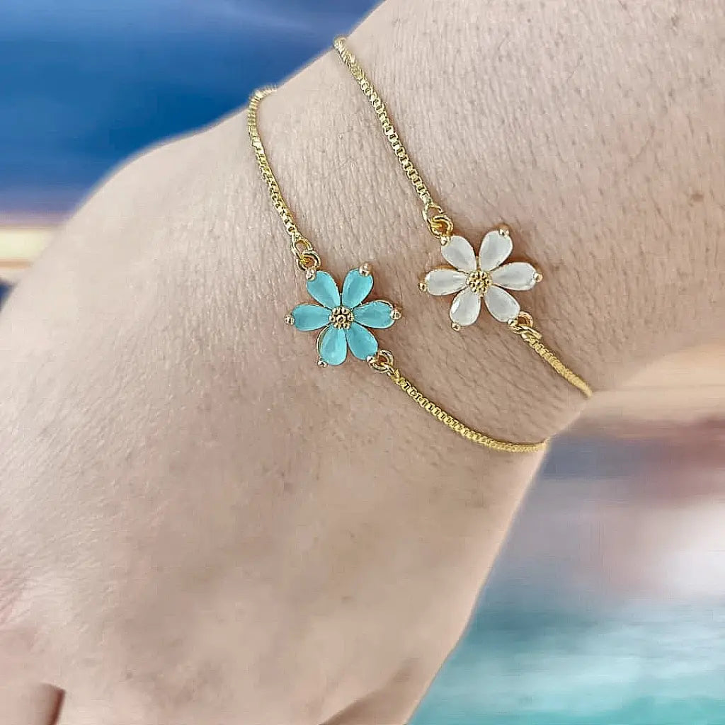 Get your Ocean Bloom Blue Flower Gold Plated Bracelet online now or in store at Forever Gems in Franschhoek, South Africa