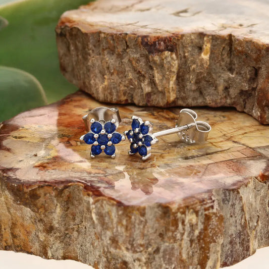 Get your Petite Sterling Silver Blue CZ Flower Stud Earrings online now or in store at Forever Gems in Franschhoek, South Africa