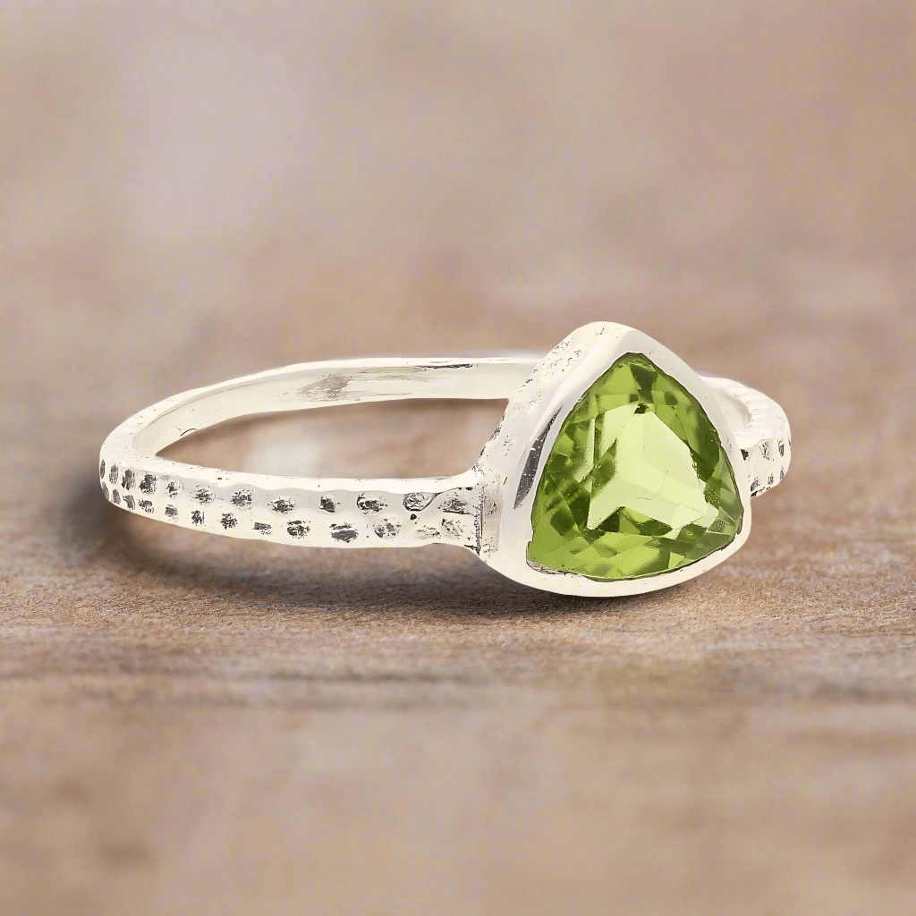 Get your Peridot Radiance: Trillion Spark Sterling Silver Ring online now or in store at Forever Gems in Franschhoek, South Africa