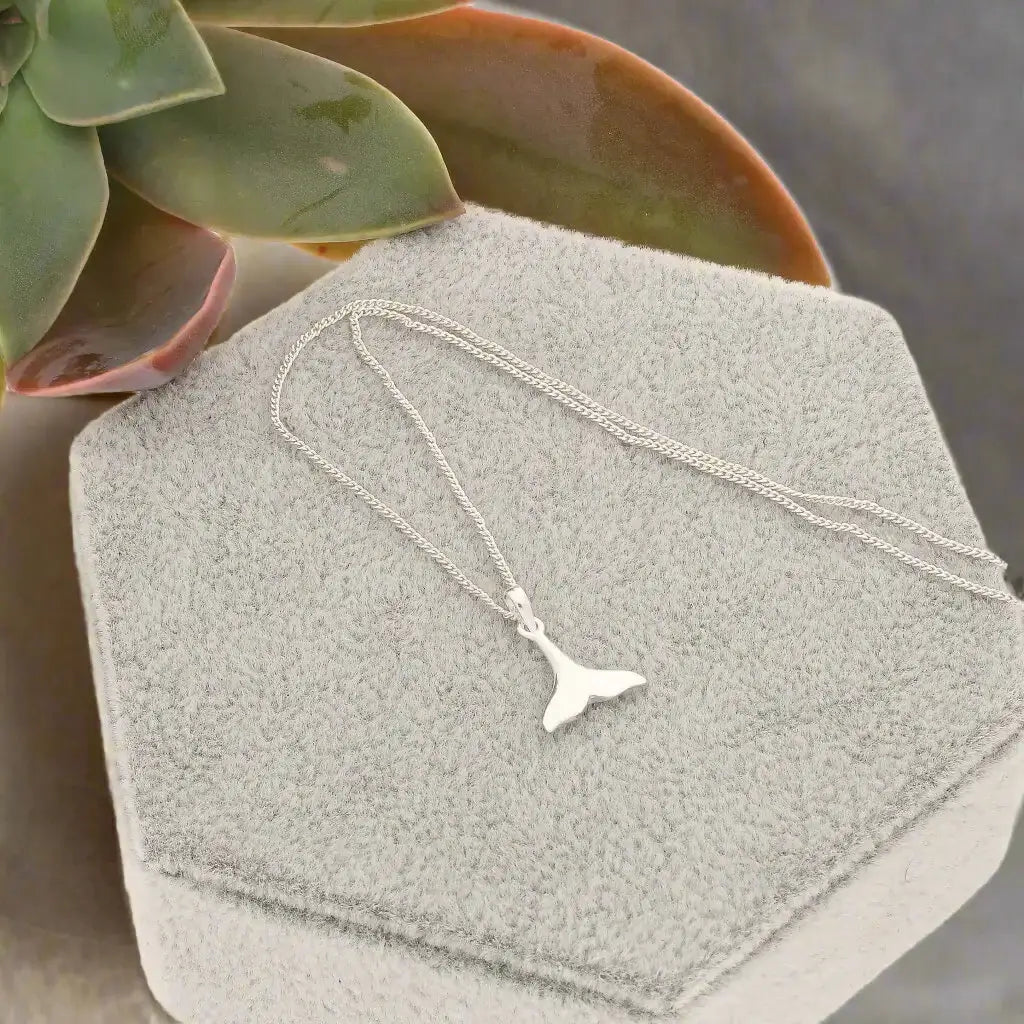 Get your Mermaid Vibes: The Perfect Sterling Silver Whale Tail Necklace. online now or in store at Forever Gems in Franschhoek, South Africa