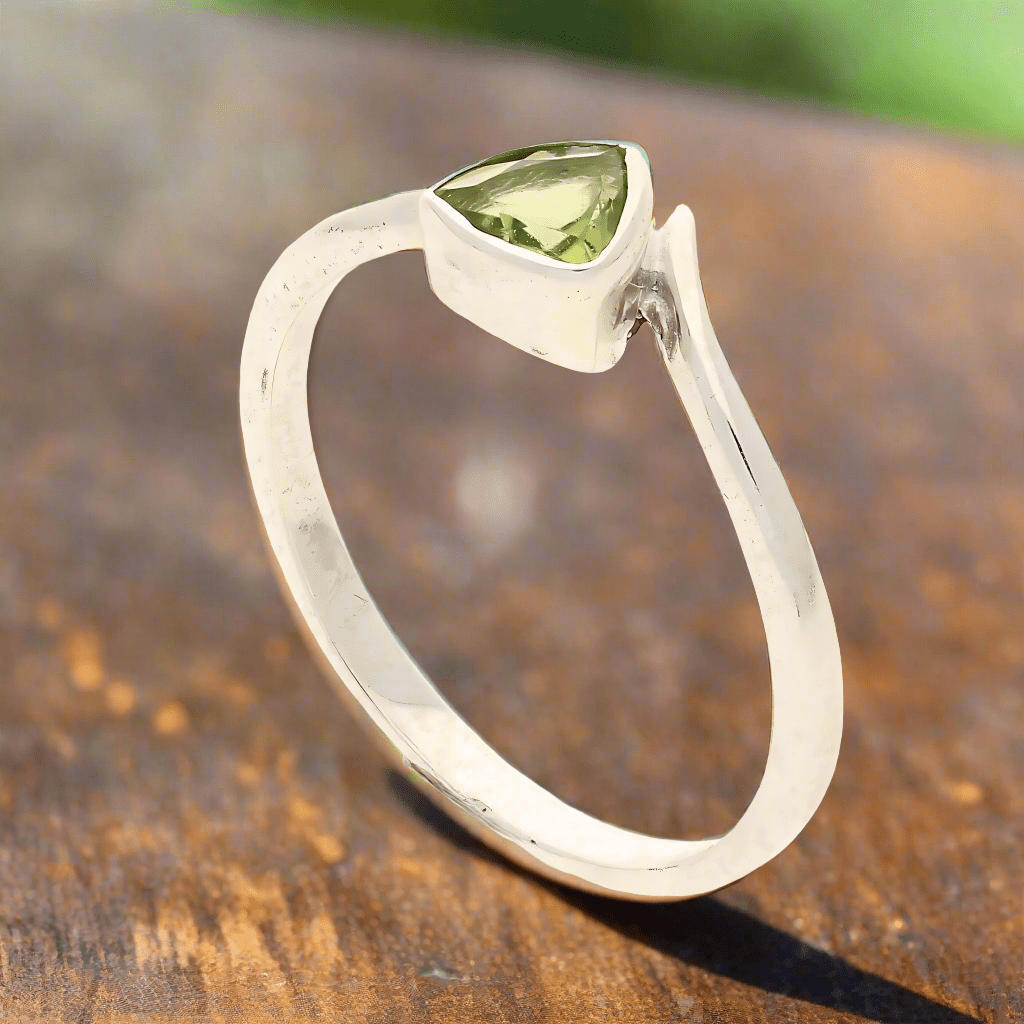 Get your Timeless Treasures: Trillion Green Peridot Ring online now or in store at Forever Gems in Franschhoek, South Africa