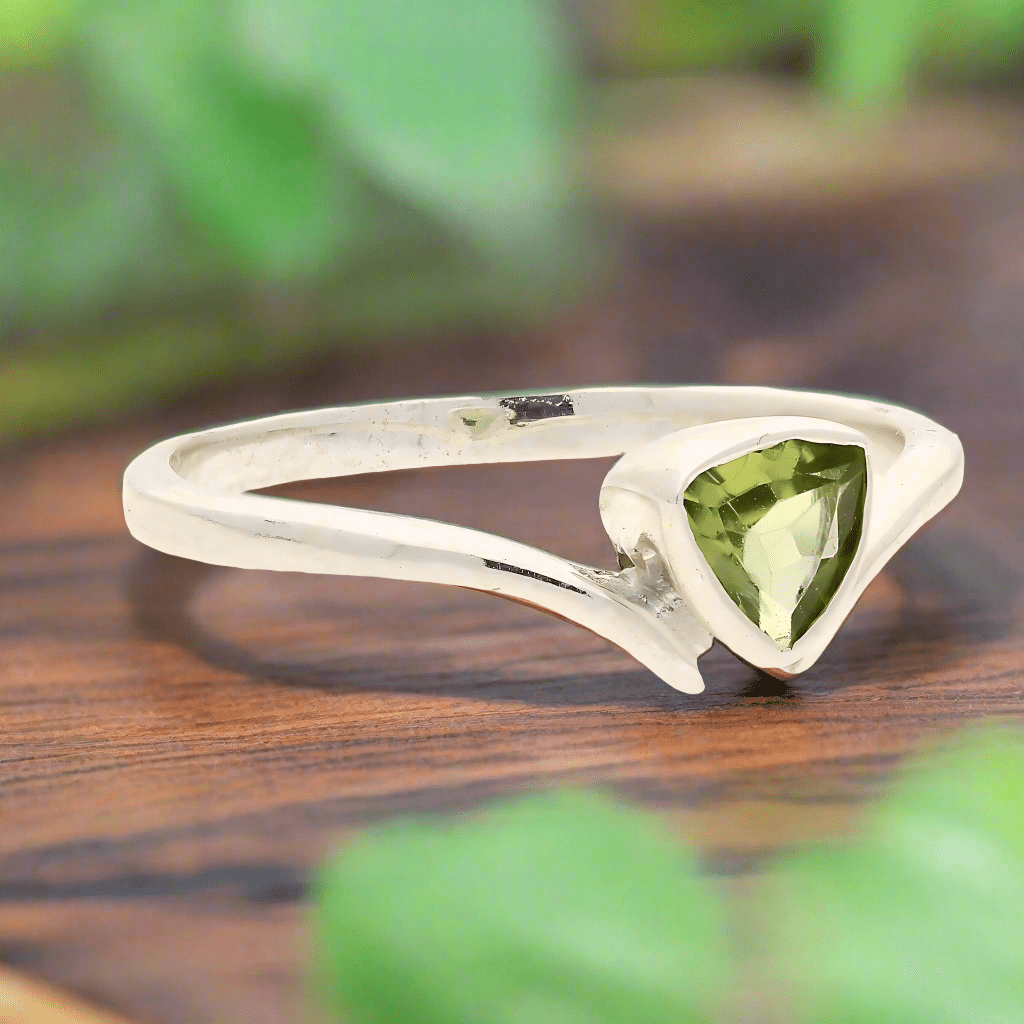 Get your Timeless Treasures: Trillion Green Peridot Ring online now or in store at Forever Gems in Franschhoek, South Africa