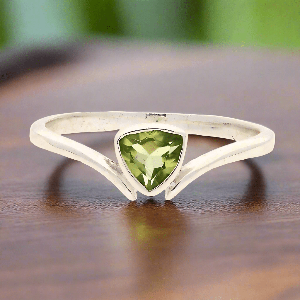 Get your Timeless Treasures: Trillion Green Peridot Ring online now or in store at Forever Gems in Franschhoek, South Africa