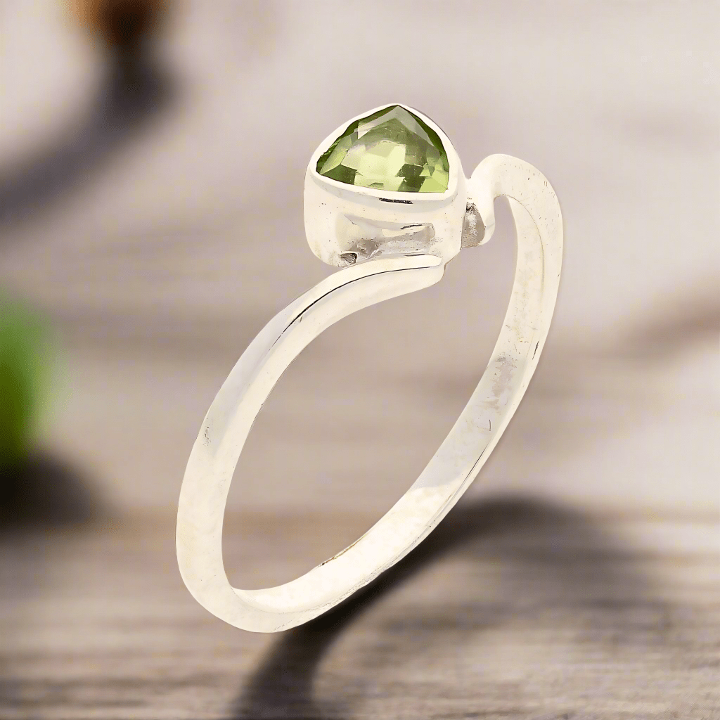 Get your Timeless Treasures: Trillion Green Peridot Ring online now or in store at Forever Gems in Franschhoek, South Africa
