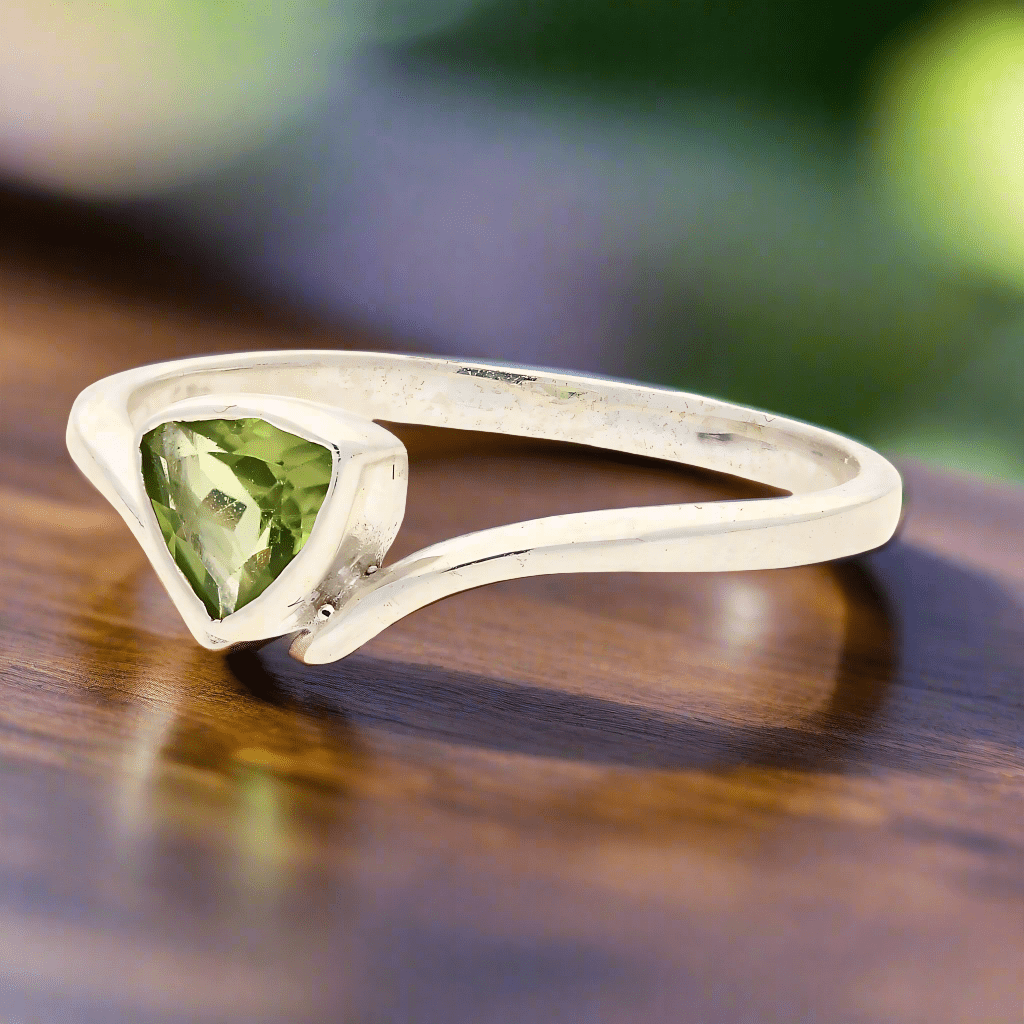 Get your Timeless Treasures: Trillion Green Peridot Ring online now or in store at Forever Gems in Franschhoek, South Africa