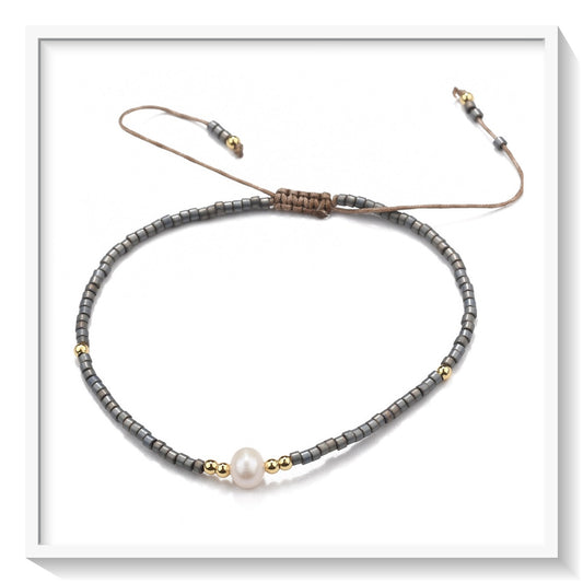 Buy your Pearl & Black Seed Bead Adjustable Bracelet online now or in store at Forever Gems in Franschhoek, South Africa