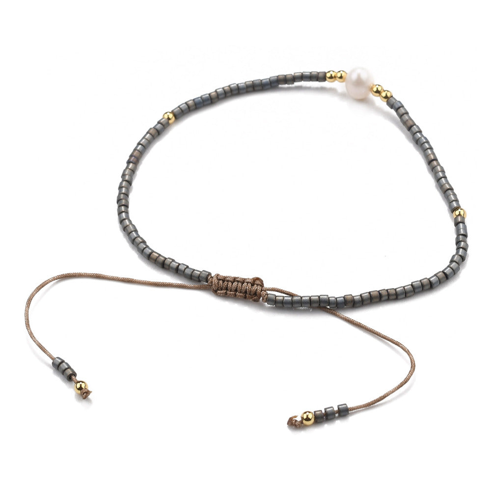 Buy your Pearl & Black Seed Bead Adjustable Bracelet online now or in store at Forever Gems in Franschhoek, South Africa