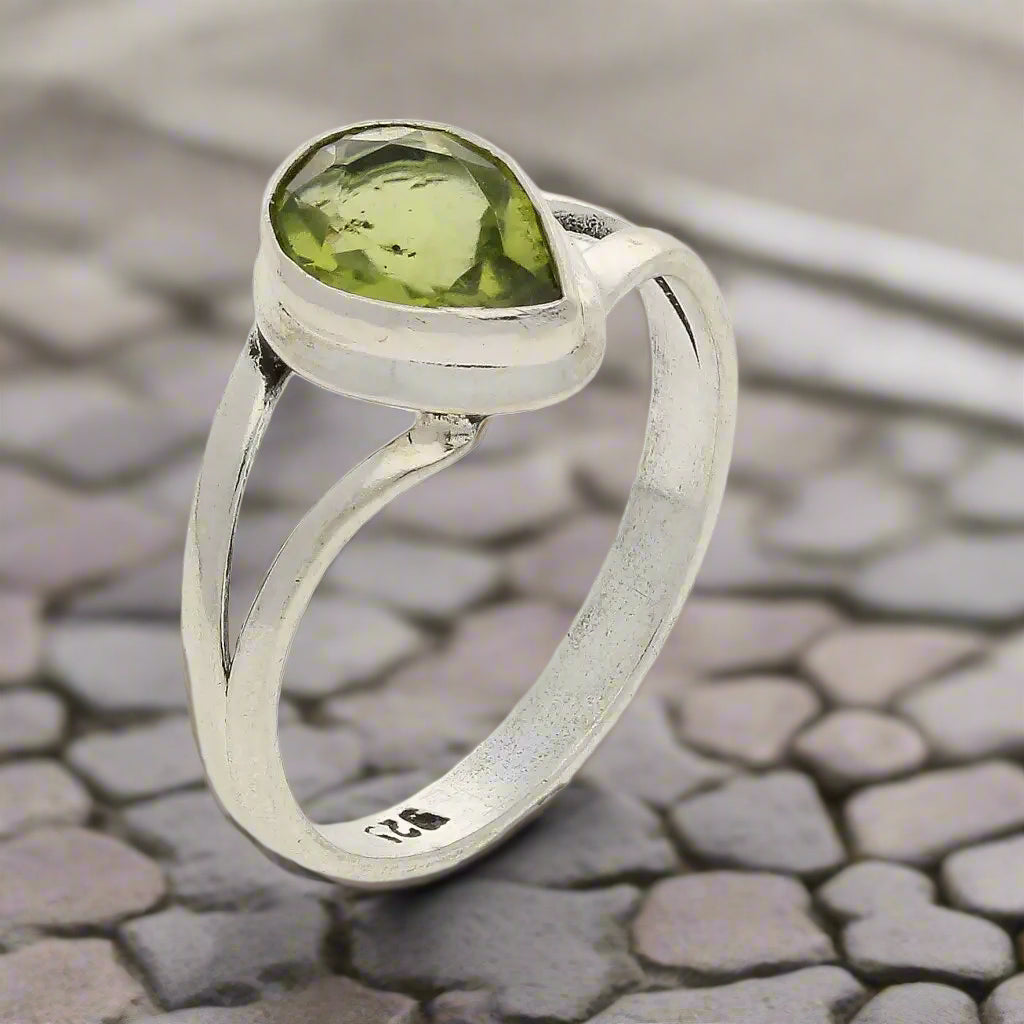Get your Contemporary Sterling Silver Peridot Ring - Split Shank Design with Teardrop Gemstone online now or in store at Forever Gems in Franschhoek, South Africa