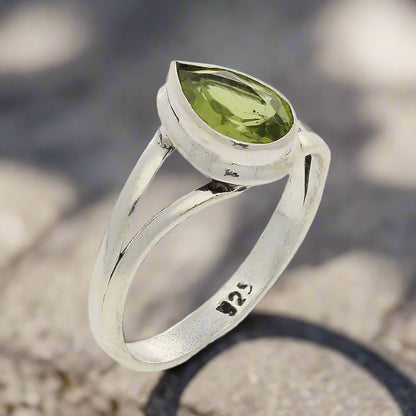 Get your Contemporary Sterling Silver Peridot Ring - Split Shank Design with Teardrop Gemstone online now or in store at Forever Gems in Franschhoek, South Africa
