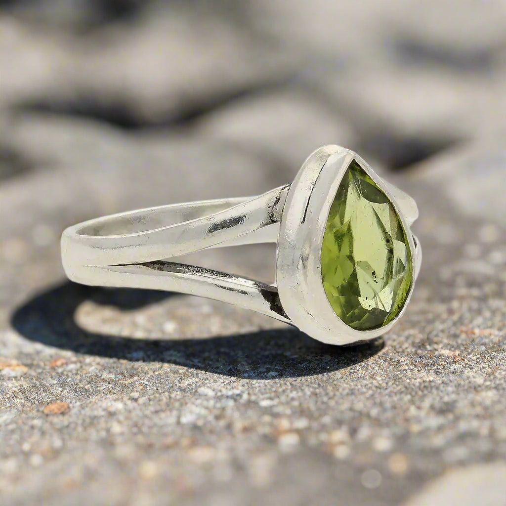 Get your Contemporary Sterling Silver Peridot Ring - Split Shank Design with Teardrop Gemstone online now or in store at Forever Gems in Franschhoek, South Africa