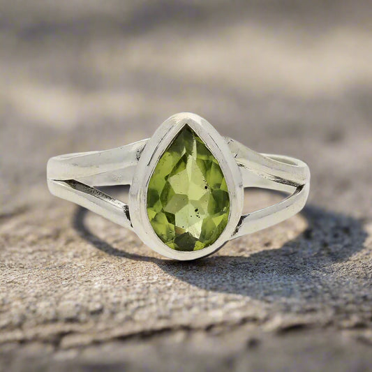 Get your Contemporary Sterling Silver Peridot Ring - Split Shank Design with Teardrop Gemstone online now or in store at Forever Gems in Franschhoek, South Africa