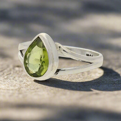 Get your Contemporary Sterling Silver Peridot Ring - Split Shank Design with Teardrop Gemstone online now or in store at Forever Gems in Franschhoek, South Africa