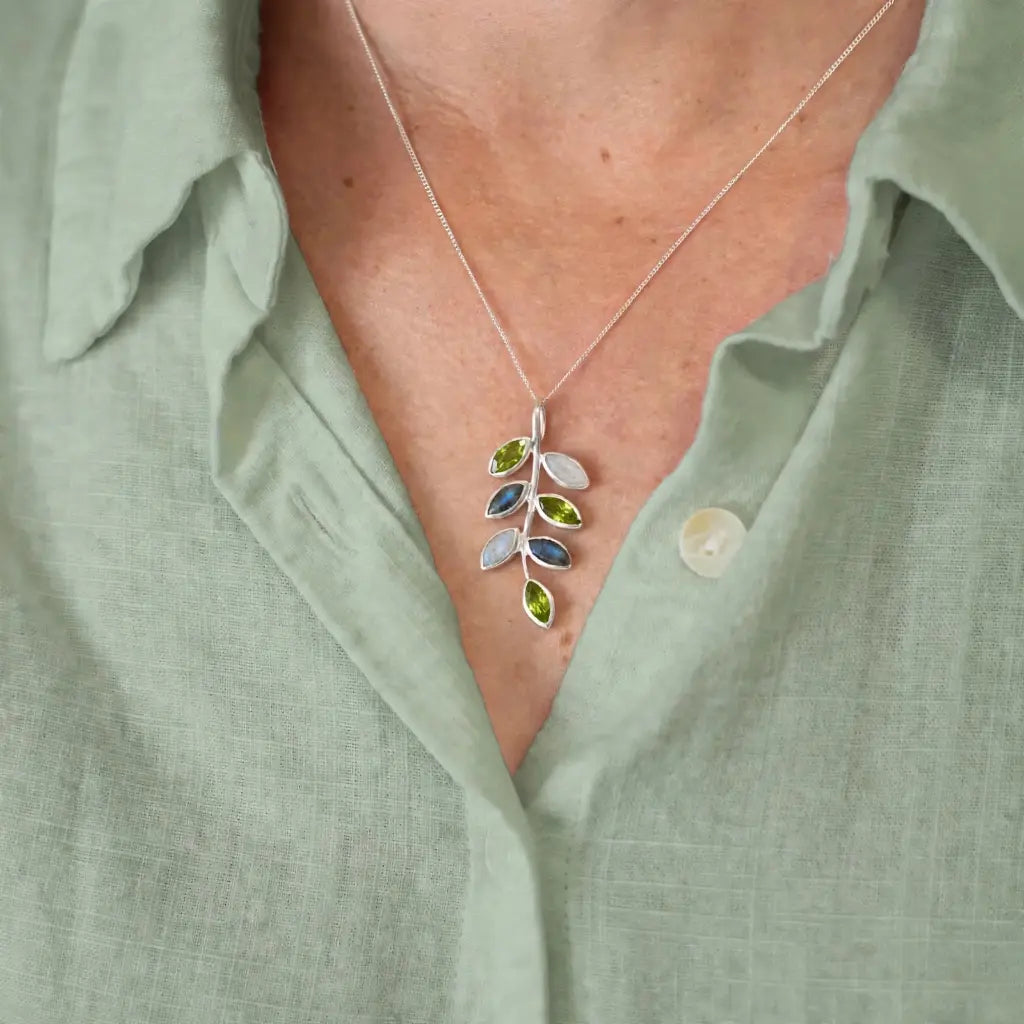Sterling silver botanical branch pendant with marquise Peridot, Rainbow Moonstone and Labradorite gemstones.
