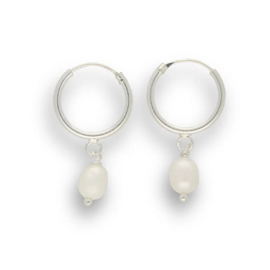 Get your Pearl Drift Natural White Oval Pearl Hoop Earrings online now or in store at Forever Gems in Franschhoek, South Africa