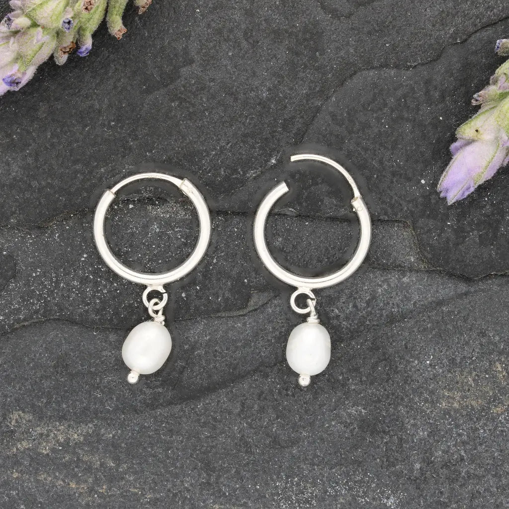 Get your Pearl Drift Natural White Oval Pearl Hoop Earrings online now or in store at Forever Gems in Franschhoek, South Africa
