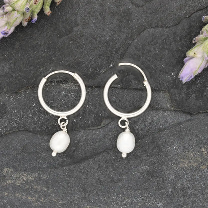 Get your Pearl Drift Natural White Oval Pearl Hoop Earrings online now or in store at Forever Gems in Franschhoek, South Africa