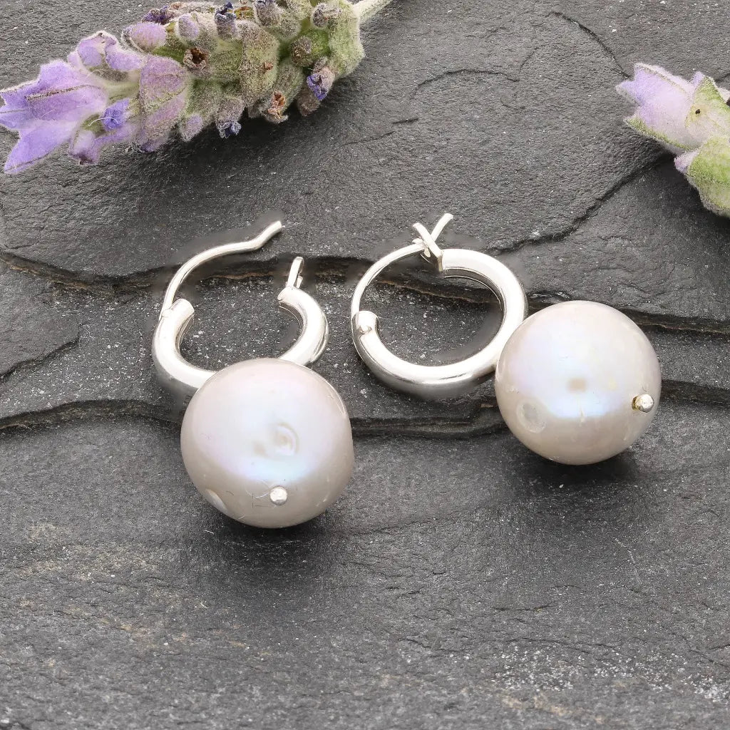 Get your Silver Storm Natural Grey Round Pearl Hoop Earrings online now or in store at Forever Gems in Franschhoek, South Africa