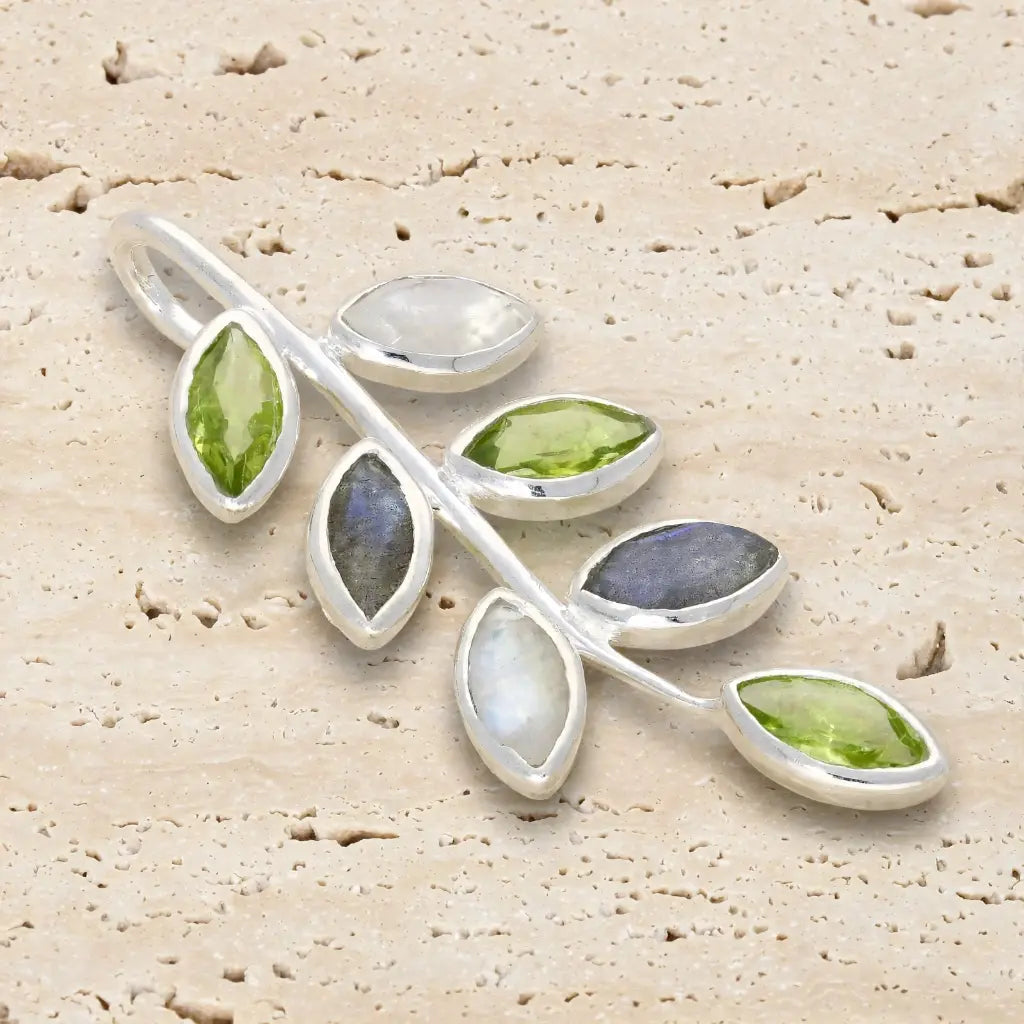 Sterling silver botanical branch pendant with marquise Peridot, Rainbow Moonstone and Labradorite gemstones.