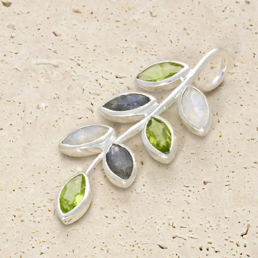 Sterling silver botanical branch pendant with marquise Peridot, Rainbow Moonstone and Labradorite gemstones.