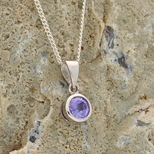 Get your Elegant Sterling Silver Tanzanite Tube Set Solitaire Necklace online now or in store at Forever Gems in Franschhoek, South Africa