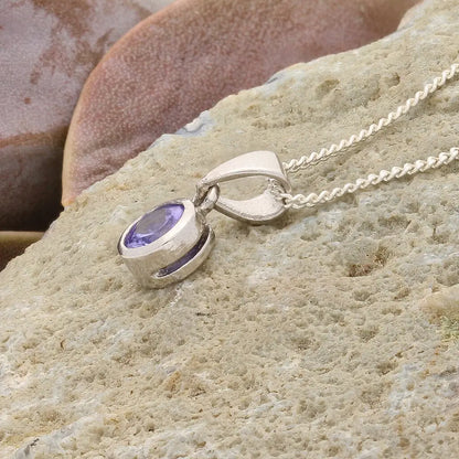 Get your Elegant Sterling Silver Tanzanite Tube Set Solitaire Necklace online now or in store at Forever Gems in Franschhoek, South Africa