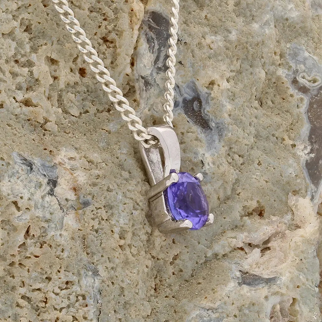 Get your Elegant 4-Claw Round Tanzanite Sterling Silver Solitaire Necklace online now or in store at Forever Gems in Franschhoek, South Africa