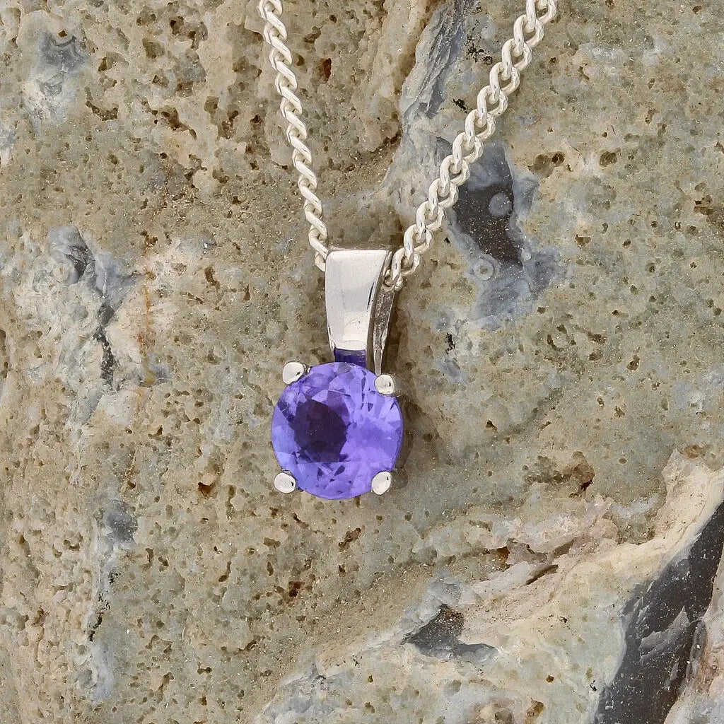 Get your Elegant 4-Claw Round Tanzanite Sterling Silver Solitaire Necklace online now or in store at Forever Gems in Franschhoek, South Africa
