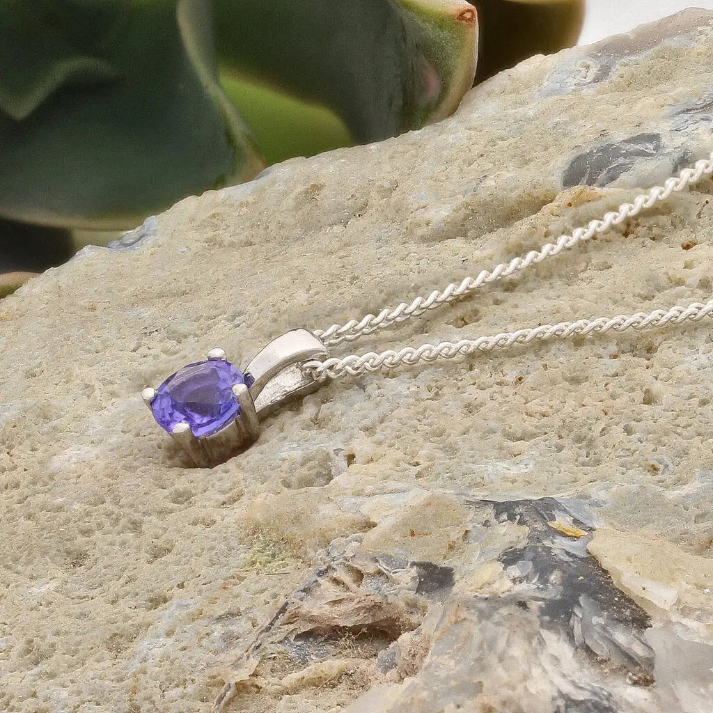 Get your Elegant 4-Claw Round Tanzanite Sterling Silver Solitaire Necklace online now or in store at Forever Gems in Franschhoek, South Africa