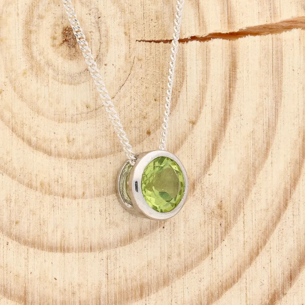 Get your Peridot Tube Set Slider Necklace online now or in store at Forever Gems in Franschhoek, South Africa
