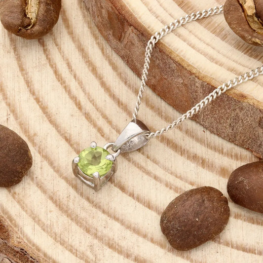 Get your Natural Peridot Classic 4-Claw Pendant Necklace in 925 Sterling Silver online now or in store at Forever Gems in Franschhoek, South Africa