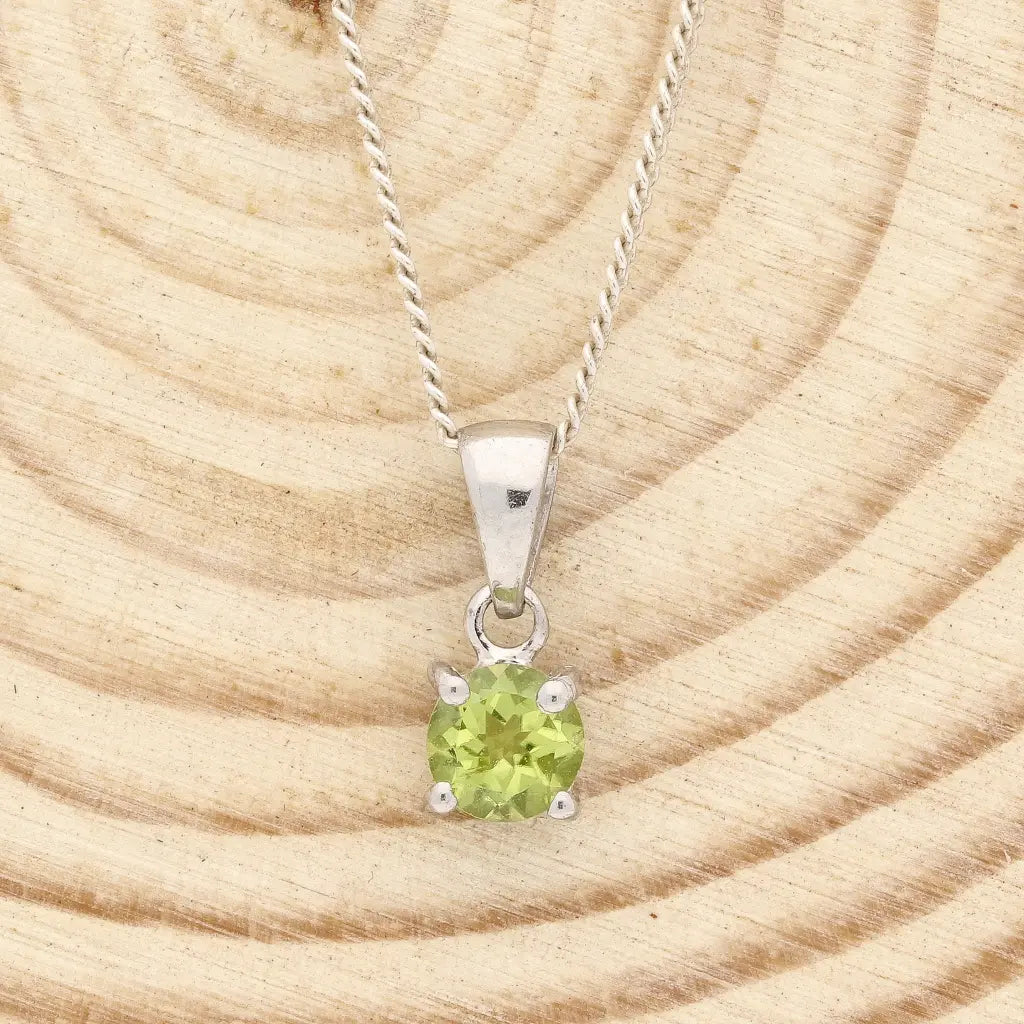 Get your Peridot 4-Claw Necklace Silver online now or in store at Forever Gems in Franschhoek, South Africa
