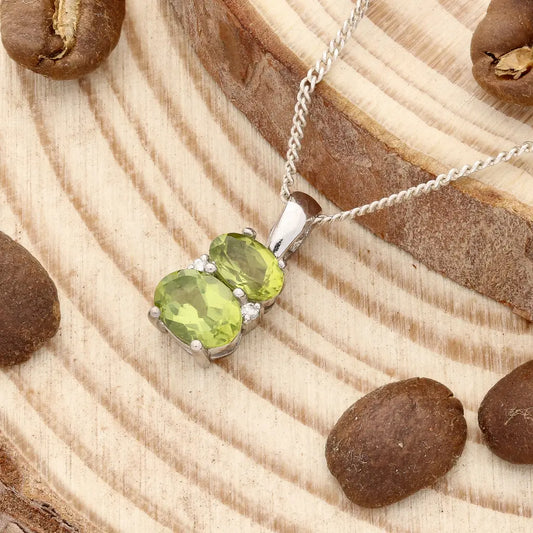 Get your Natural Oval Peridot Two-Stone Pendant Necklace in 925 Sterling Silver online now or in store at Forever Gems in Franschhoek, South Africa