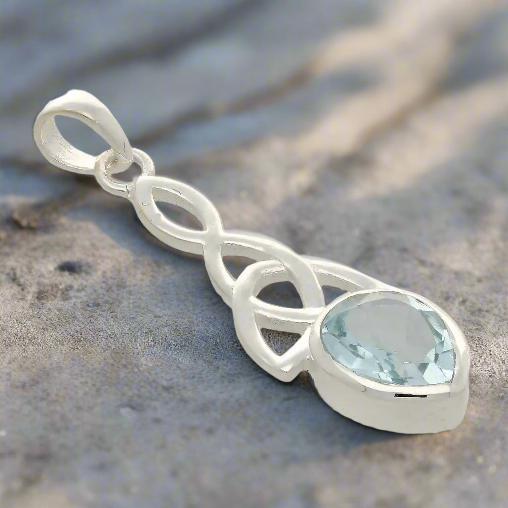 Buy your Blue Topaz Teardrop Sterling Silver Pendant - The Trinity Knot online now or in store at Forever Gems in Franschhoek, South Africa