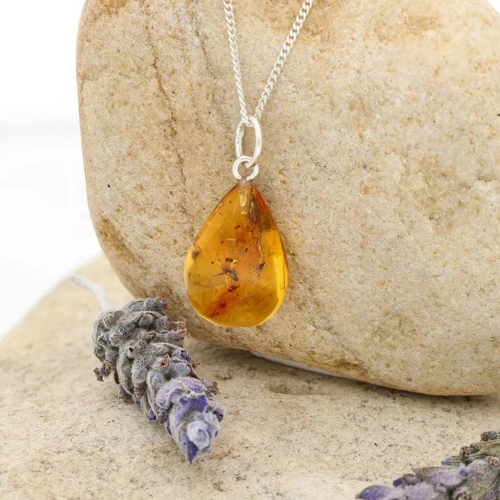 Get your Real Baltic Amber Teardrop Pendant - Prehistoric Insect Inclusions online now or in store at Forever Gems in Franschhoek, South Africa