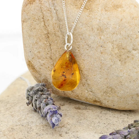 Get your Real Baltic Amber Teardrop Pendant - Prehistoric Insect Inclusions online now or in store at Forever Gems in Franschhoek, South Africa