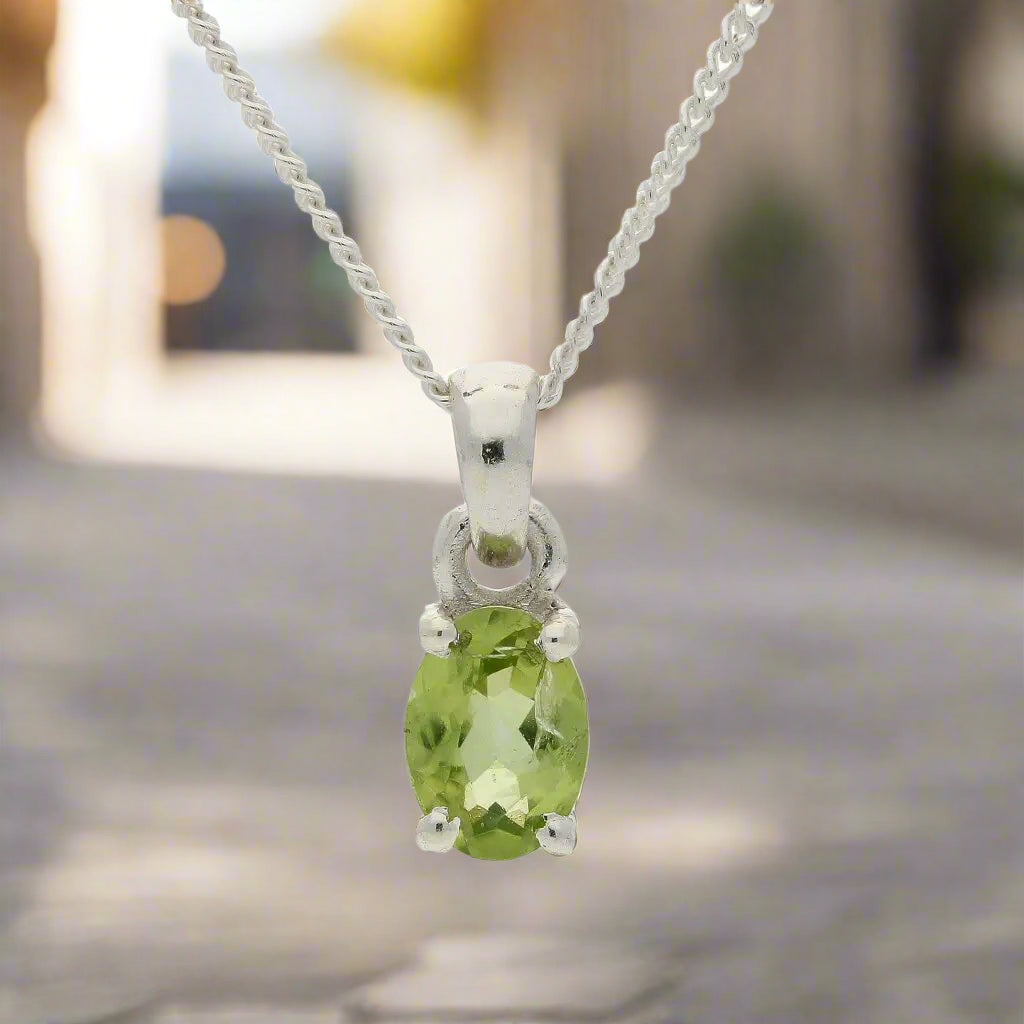 Get your Peridot "Garden Whispers" Sterling Silver Pendant - Nature's Green Magic online now or in store at Forever Gems in Franschhoek, South Africa
