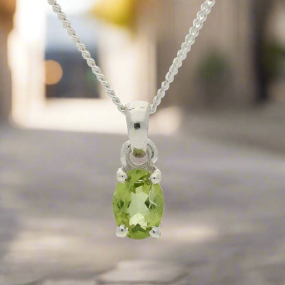 Get your Peridot "Garden Whispers" Sterling Silver Pendant - Nature's Green Magic online now or in store at Forever Gems in Franschhoek, South Africa