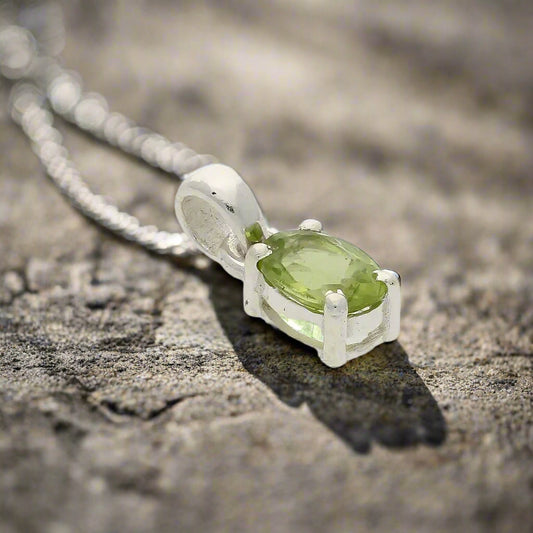 Get your Peridot "Garden Whispers" Sterling Silver Pendant - Nature's Green Magic online now or in store at Forever Gems in Franschhoek, South Africa