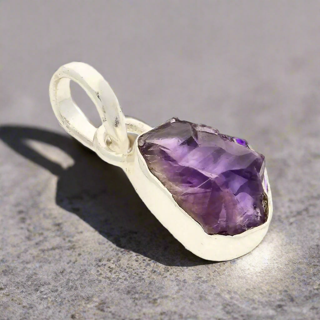 Buy your Spiritual Calm - Rough Amethyst Pendant online now or in store at Forever Gems in Franschhoek, South Africa