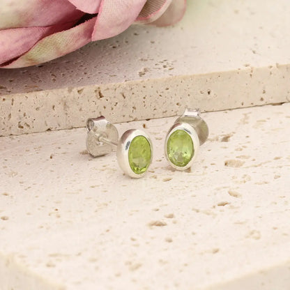 Oval Peridot Bezel Stud Earrings