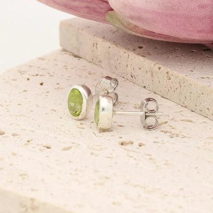 Oval Peridot Bezel Stud Earrings